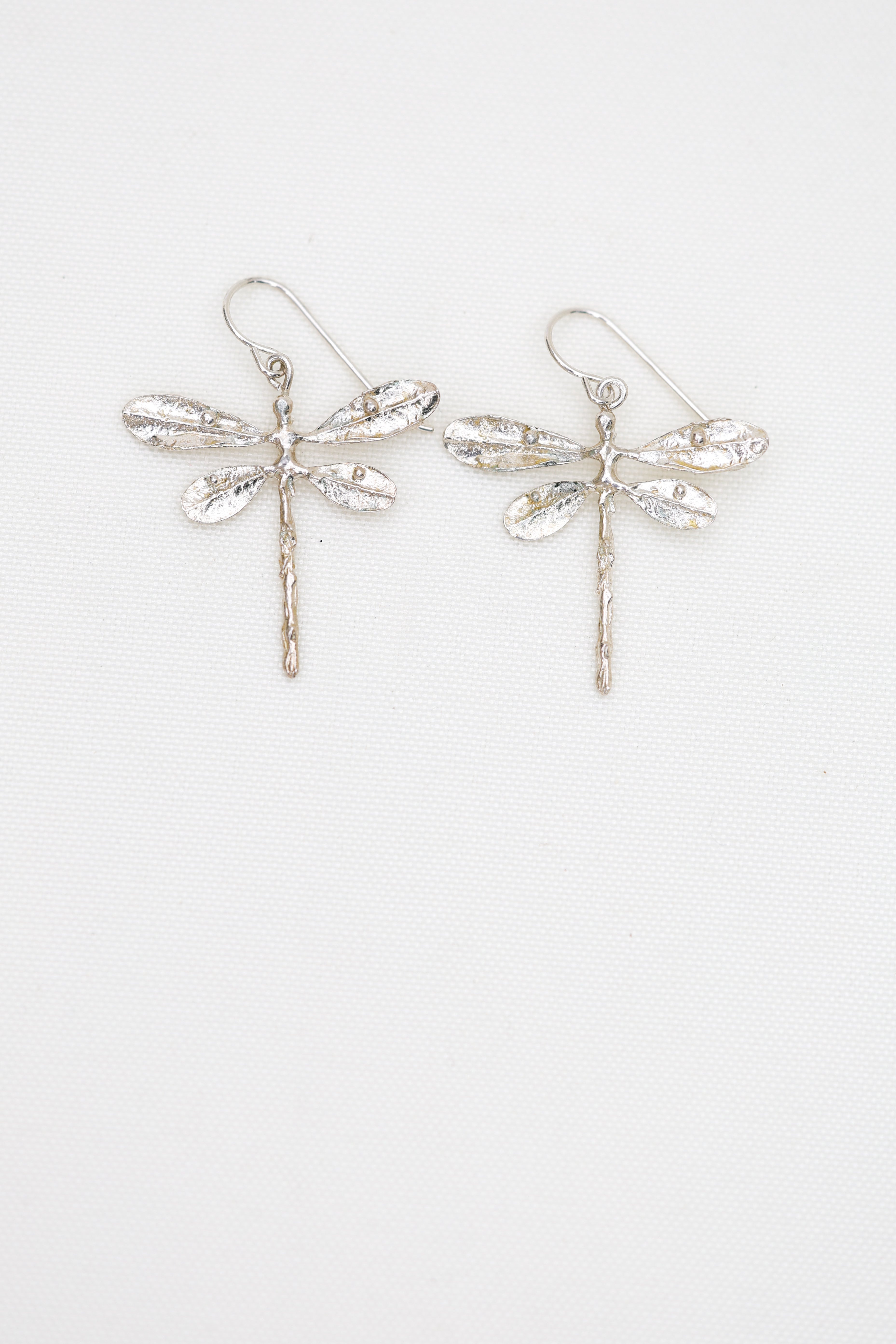 Dragonfly dangles lightweight and made in sterling silver or brass, lost wax cast