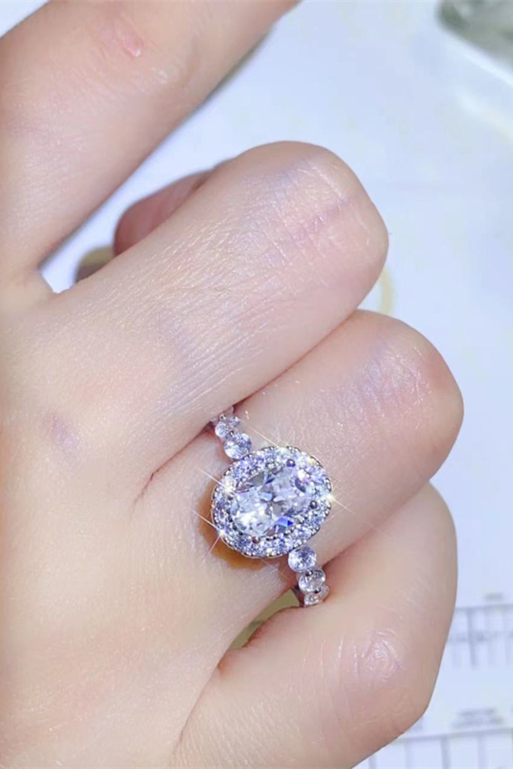 Adored 1 Carat Oval-Cut Sparkala™ Platinum Over Pure Sterling Silver Halo Ring