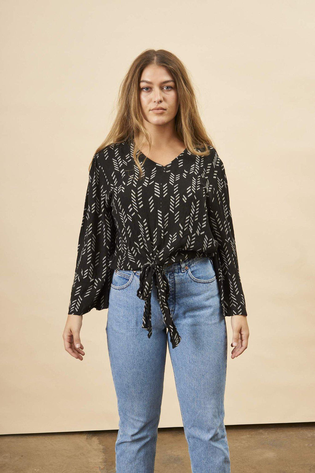 Stylized Feather Tie Knot Blouse in Black + Cream