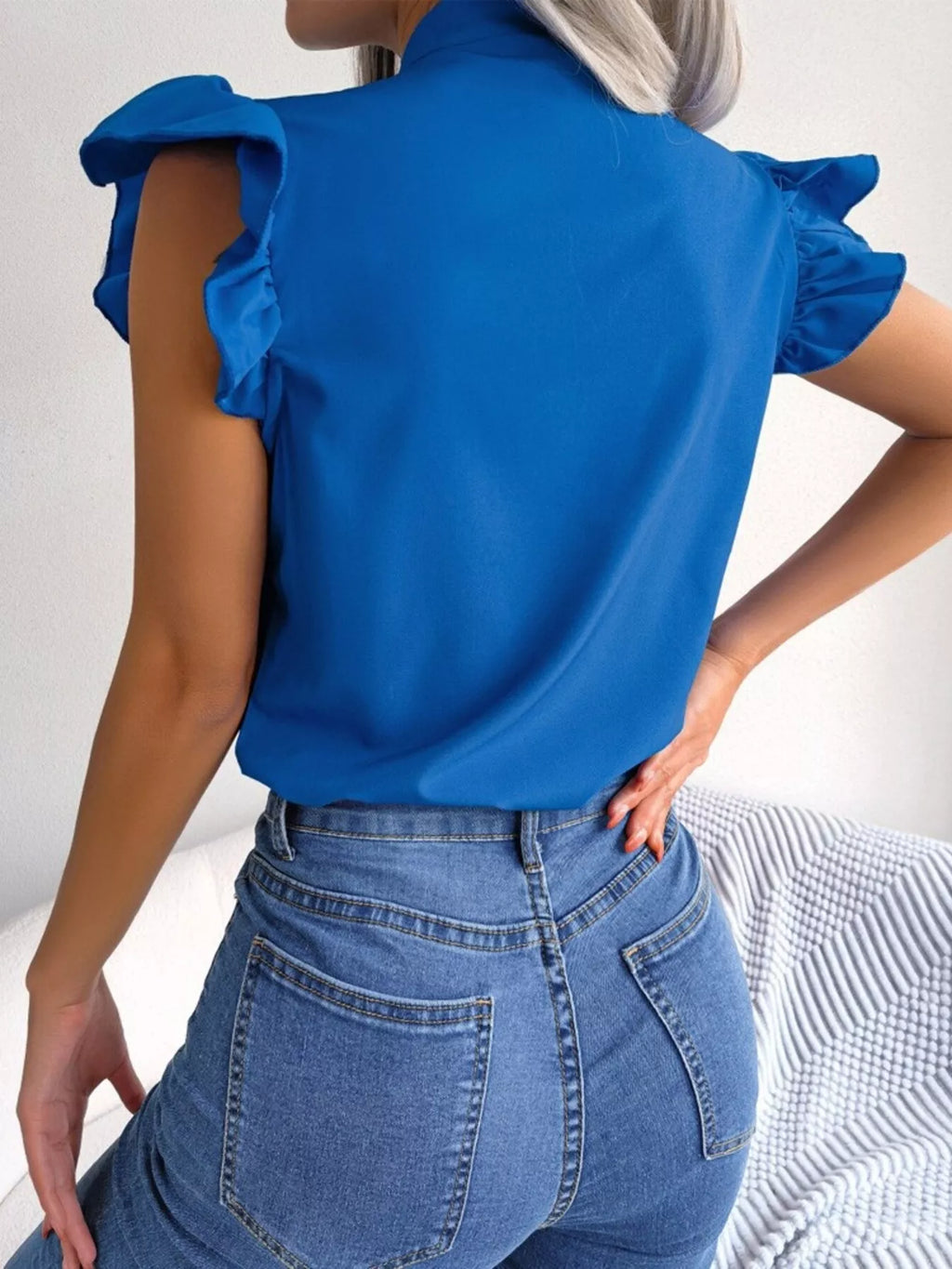 White Ruffle Sleeve Blouse with Elegant Bow Tie Detail