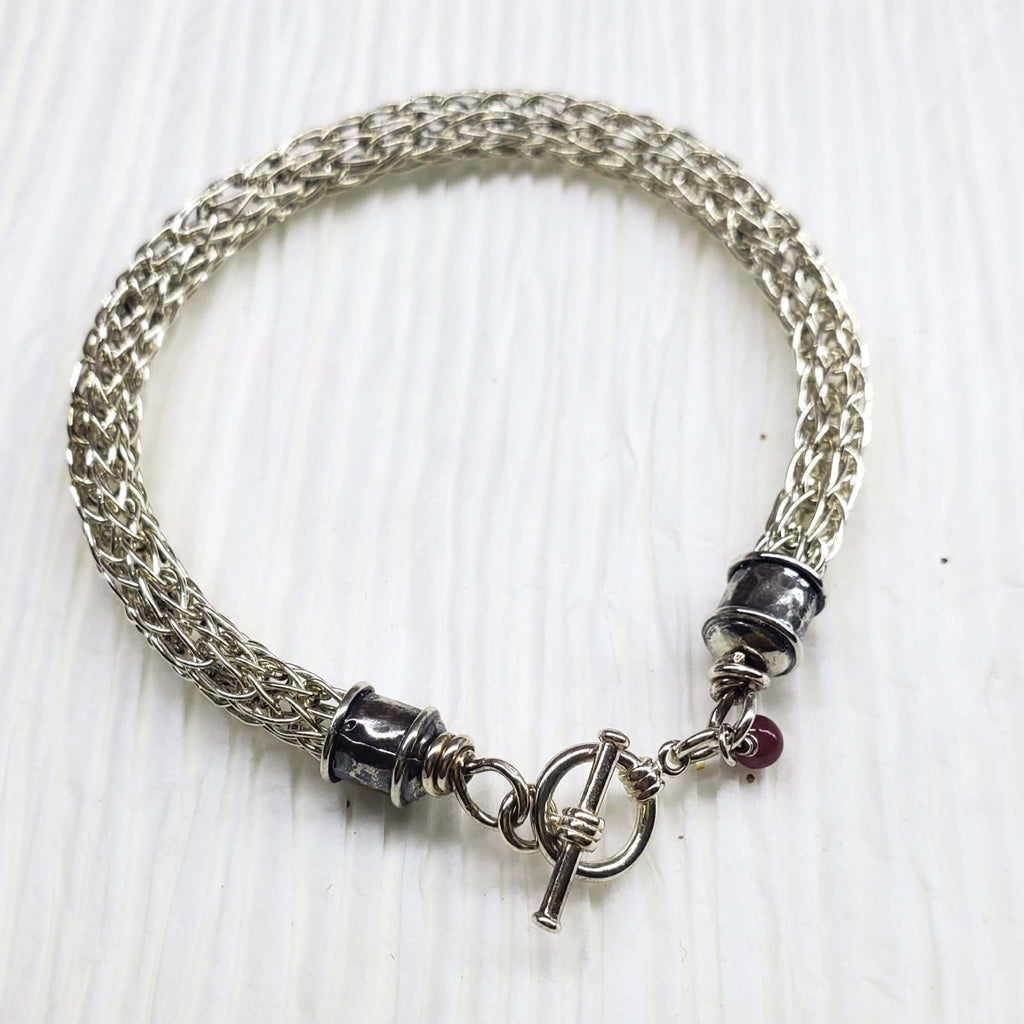 Handmade 10mm silver Viking knit bracelet with Ruby charm