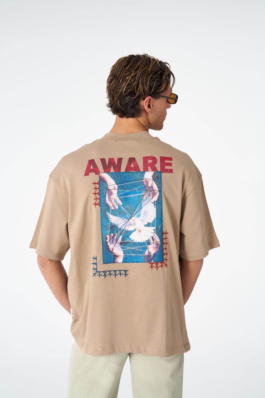 Oversize Cotton Tee / "AWARE" Dove Hands Symbolic Graphic Print