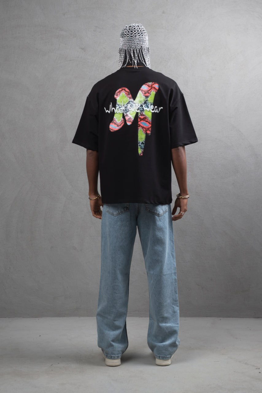 Oversize Graphic Cotton Tee – "What We Wear" Abstract Print