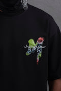 Oversize Graphic Cotton Tee – "What We Wear" Abstract Print
