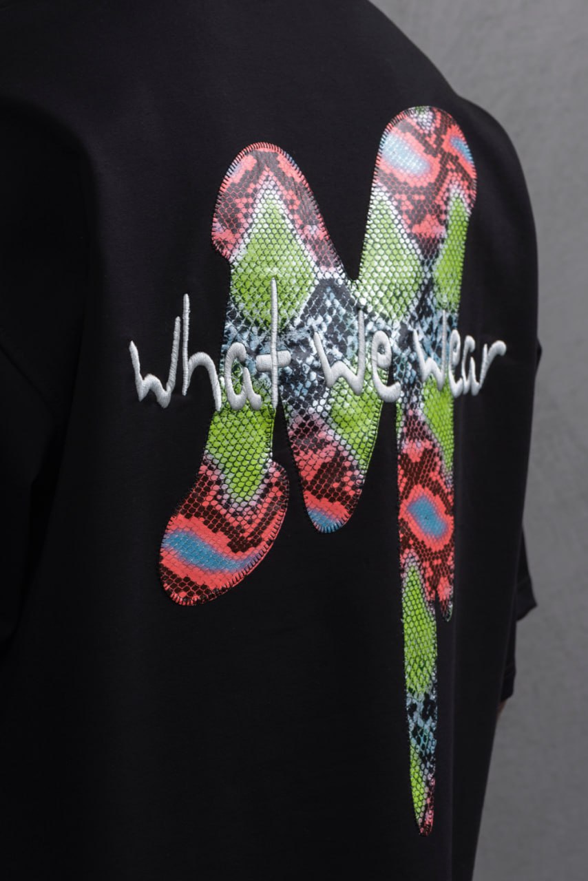 Oversize Graphic Cotton Tee – "What We Wear" Abstract Print