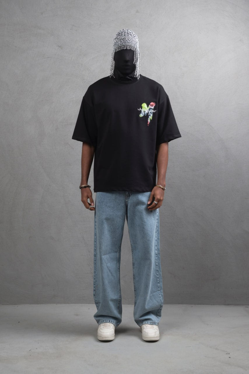 Oversize Graphic Cotton Tee – "What We Wear" Abstract Print