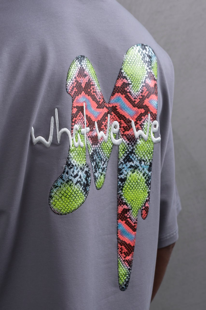 Oversize Graphic Cotton Tee – "What We Wear" Abstract Print
