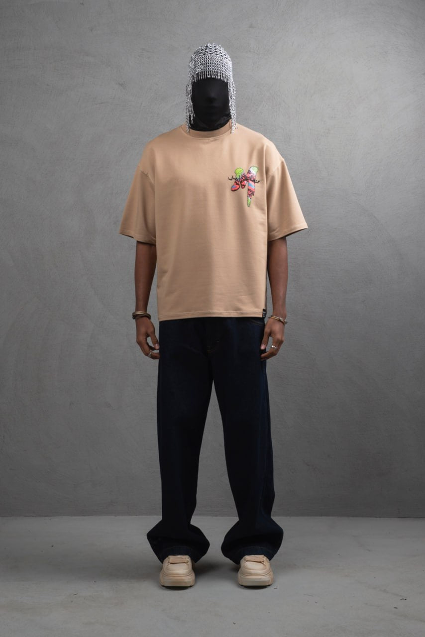 Oversize Graphic Cotton Tee – "What We Wear" Abstract Print