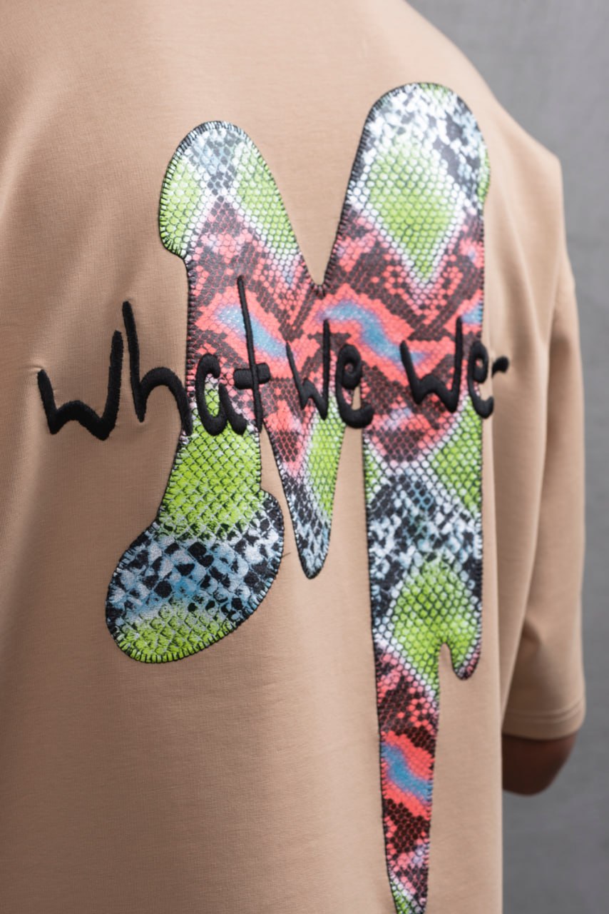 Oversize Graphic Cotton Tee – "What We Wear" Abstract Print