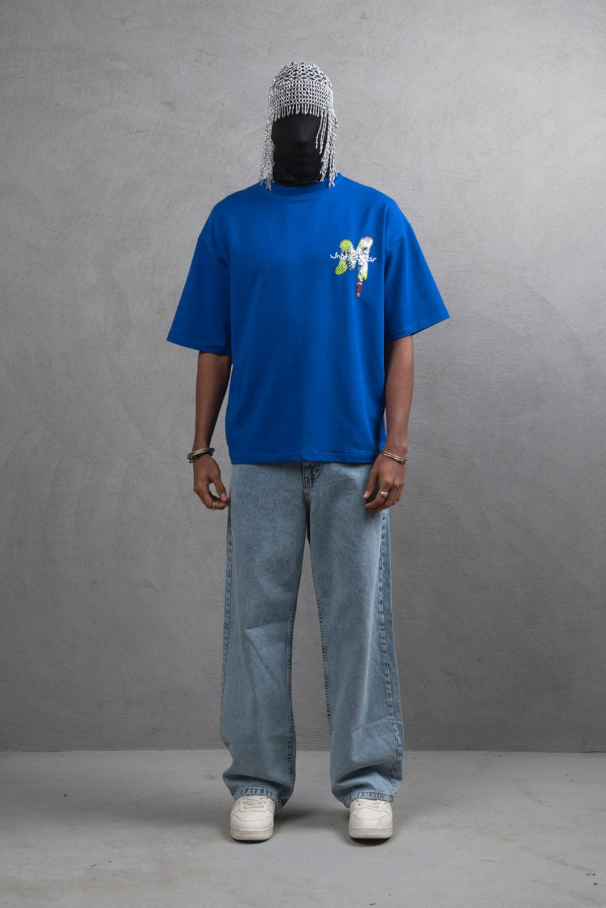 Oversize Graphic Cotton Tee – "What We Wear" Abstract Print