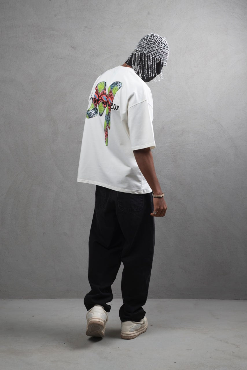 Oversize Graphic Cotton Tee – "What We Wear" Abstract Print