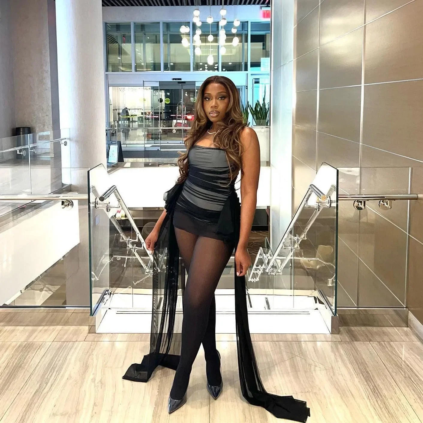 Bring That Energy Black Ruched Mini Dress