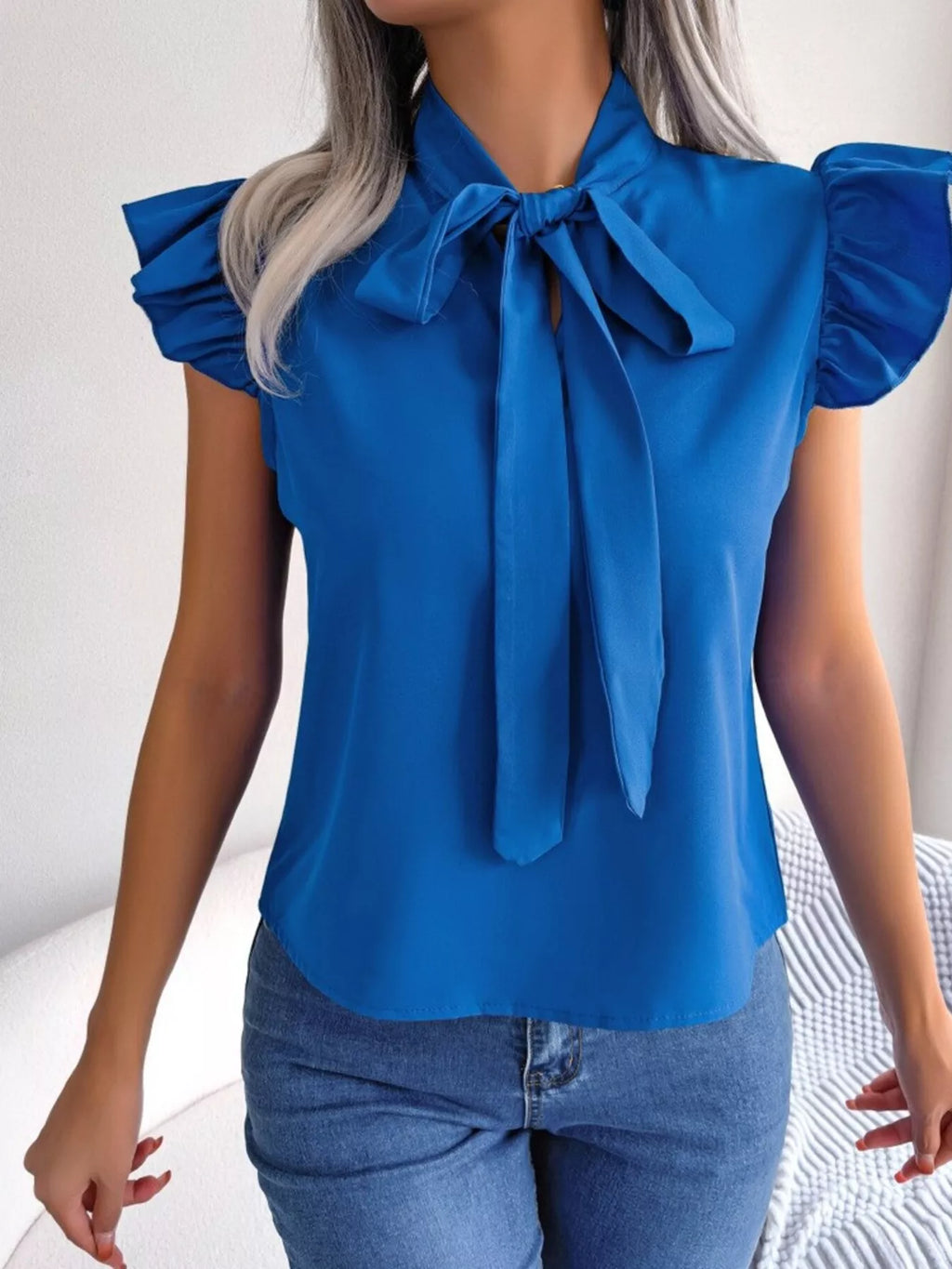 White Ruffle Sleeve Blouse with Elegant Bow Tie Detail