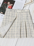 Women's Pleated Plaid Mini Skirt with Buckle Detail