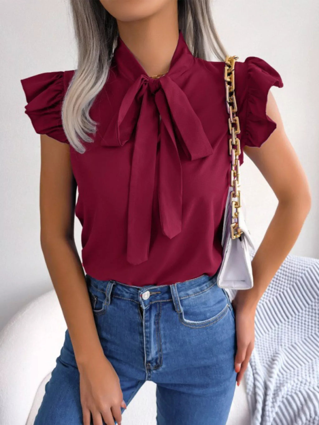 White Ruffle Sleeve Blouse with Elegant Bow Tie Detail