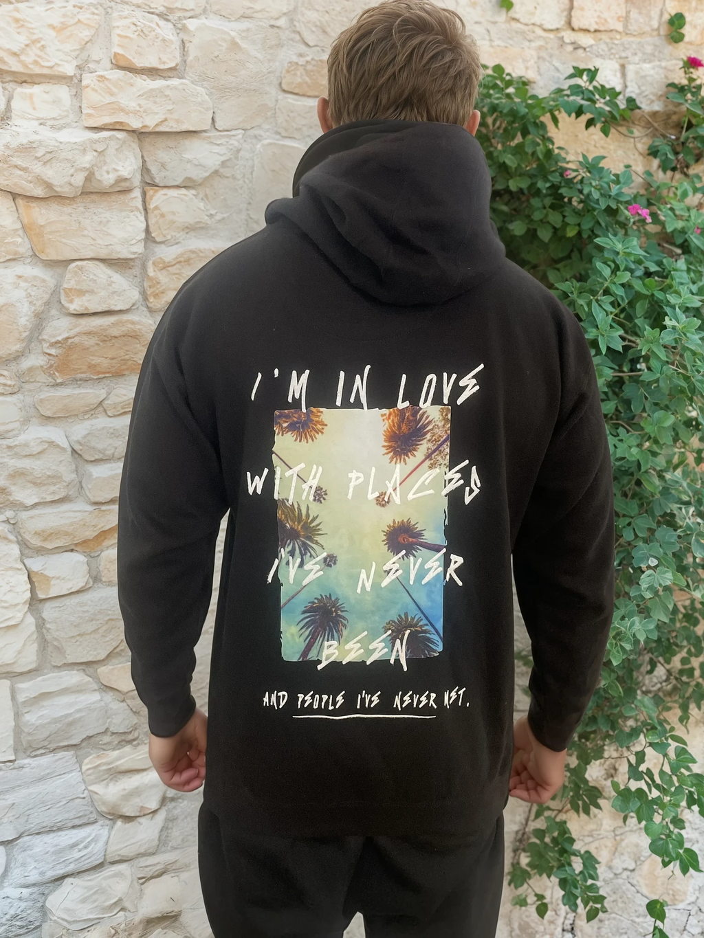 "I'm In Love With Places I've Never And People I've Never Met" Hoodie (Black)